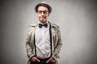 Stylish Gentleman in Formal Attire with Hat and Glasses