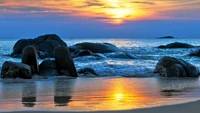 Serene Sunset Over Rocky Shoreline