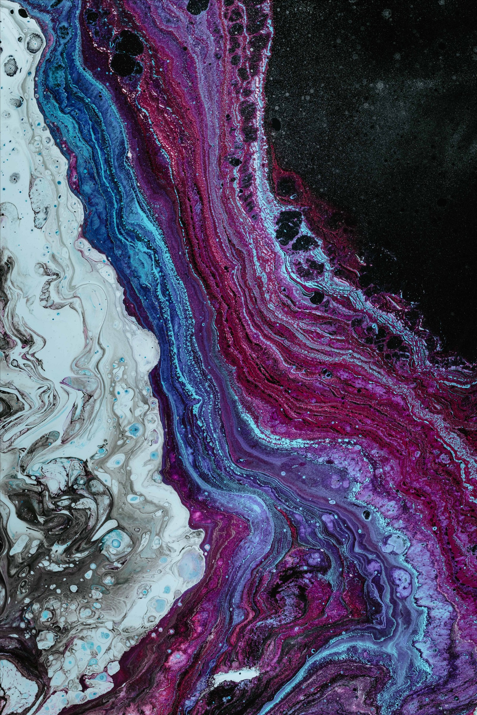 A close up of a painting of a purple and blue swirl (paint, purple, pink, blue, water)