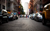 Escena urbana de calle con coches y actividad en el carril