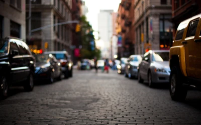 Urban Street Scene with Cars and Lane Activity