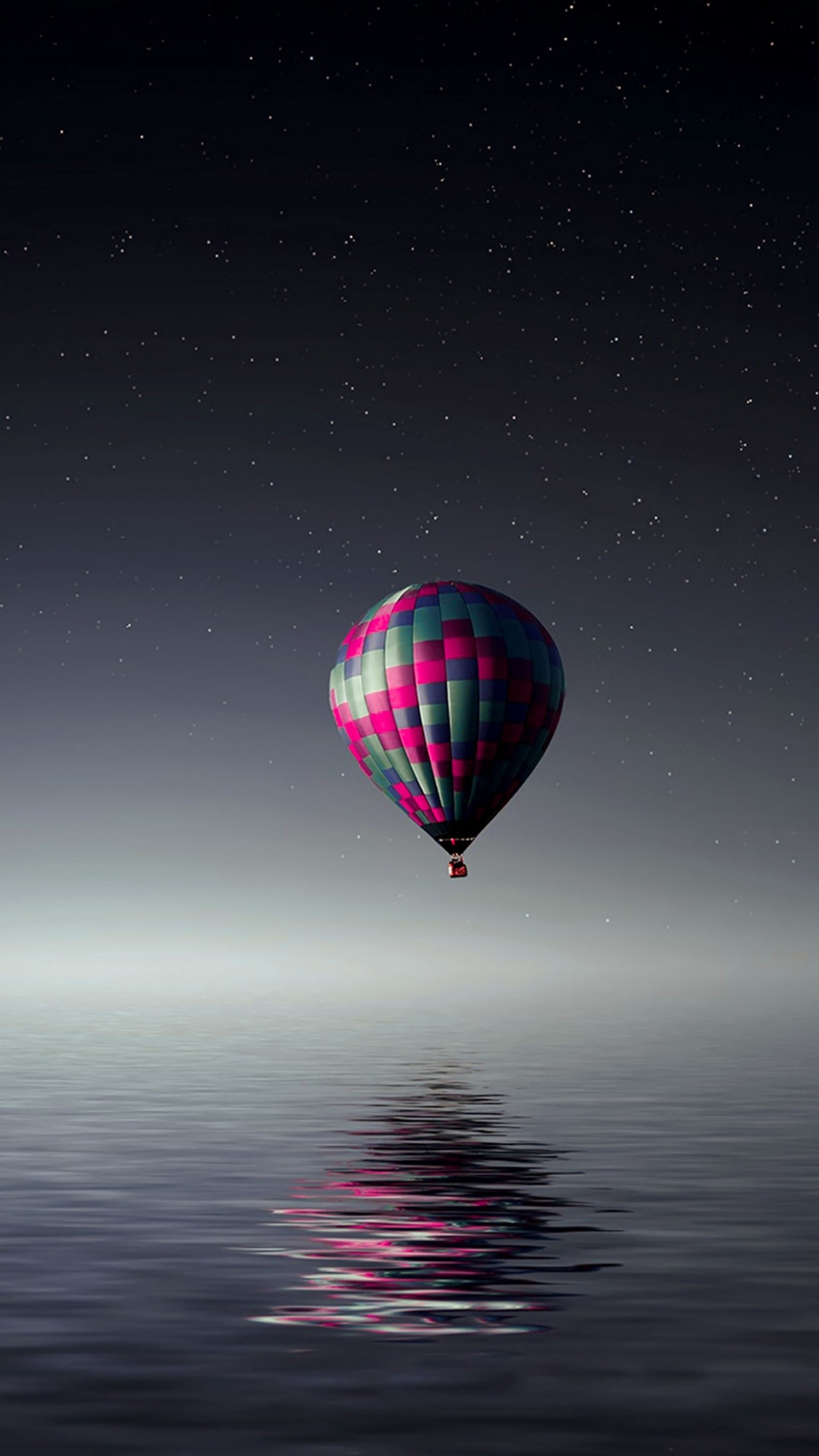 Arafed hot air balloon floating in the air over the ocean (adventure, balloon, flight, gray, pink)