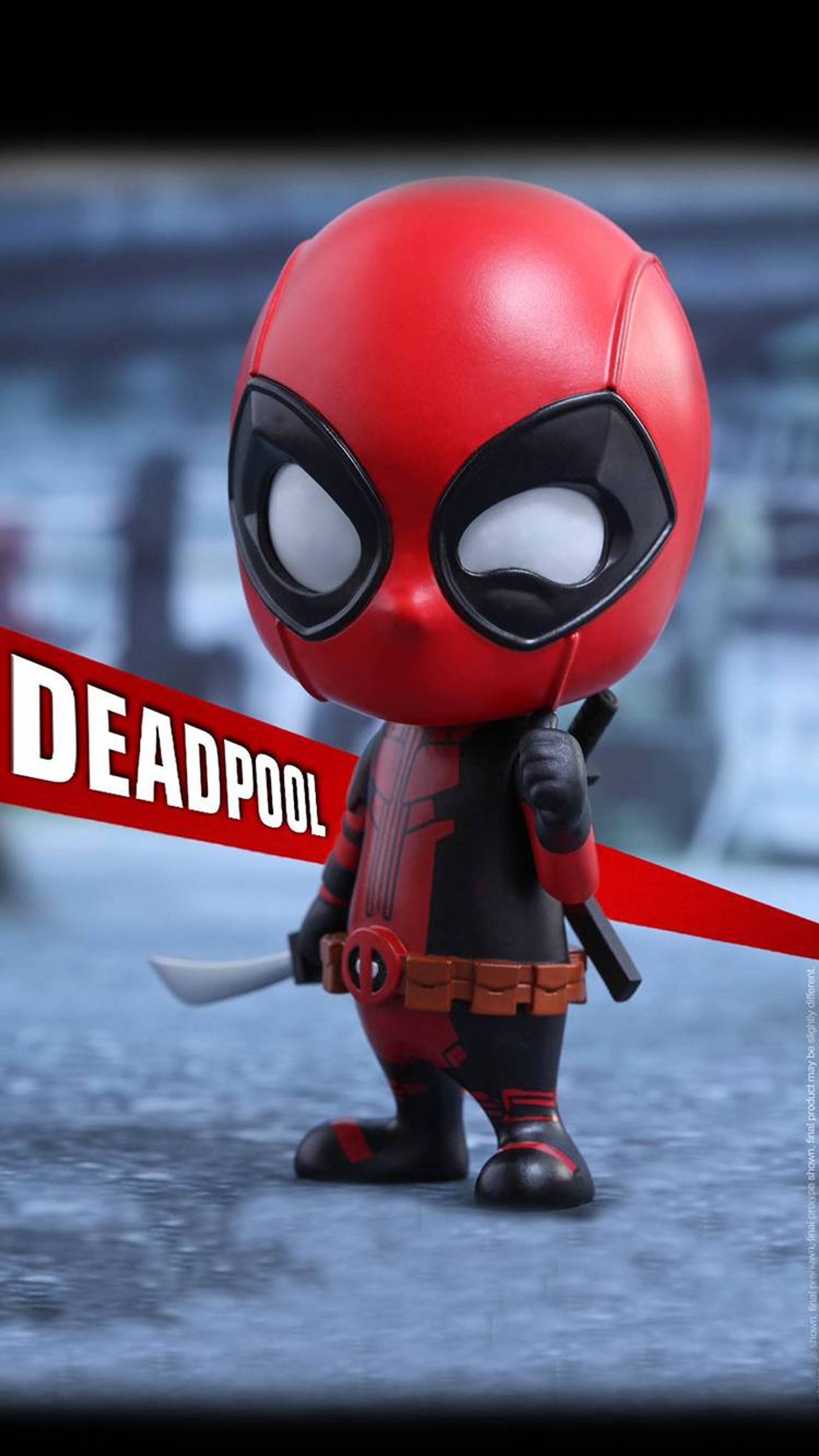 Un primer plano de una figura de deadpool sosteniendo un cuchillo (niños, calavera)