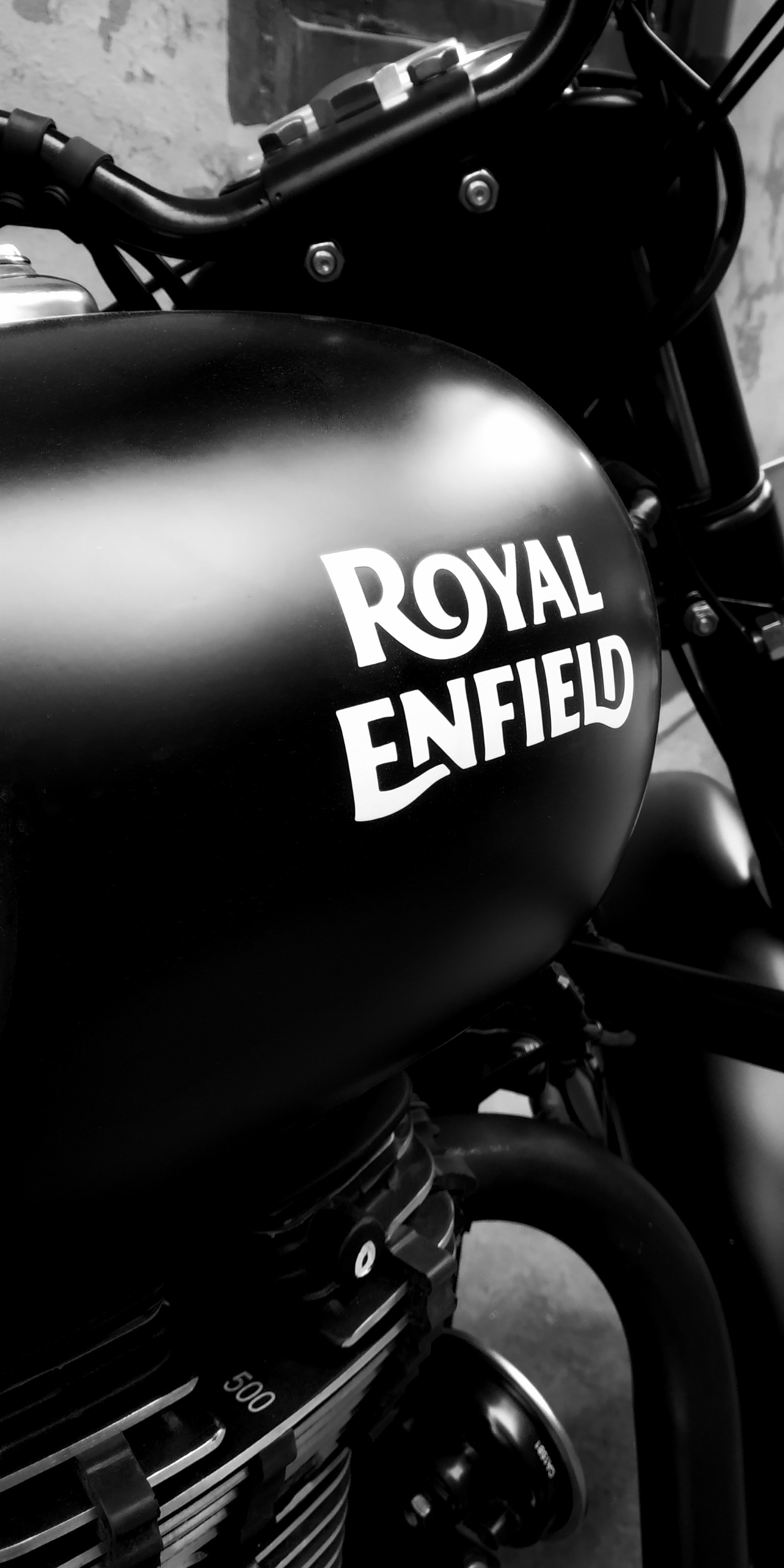 A close up of a motorcycle with a royal enfield logo on it (bike lovers, enfield, royal enfield)