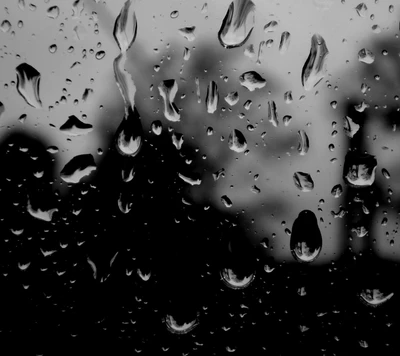 Melancholic Raindrops on a Darkened Window