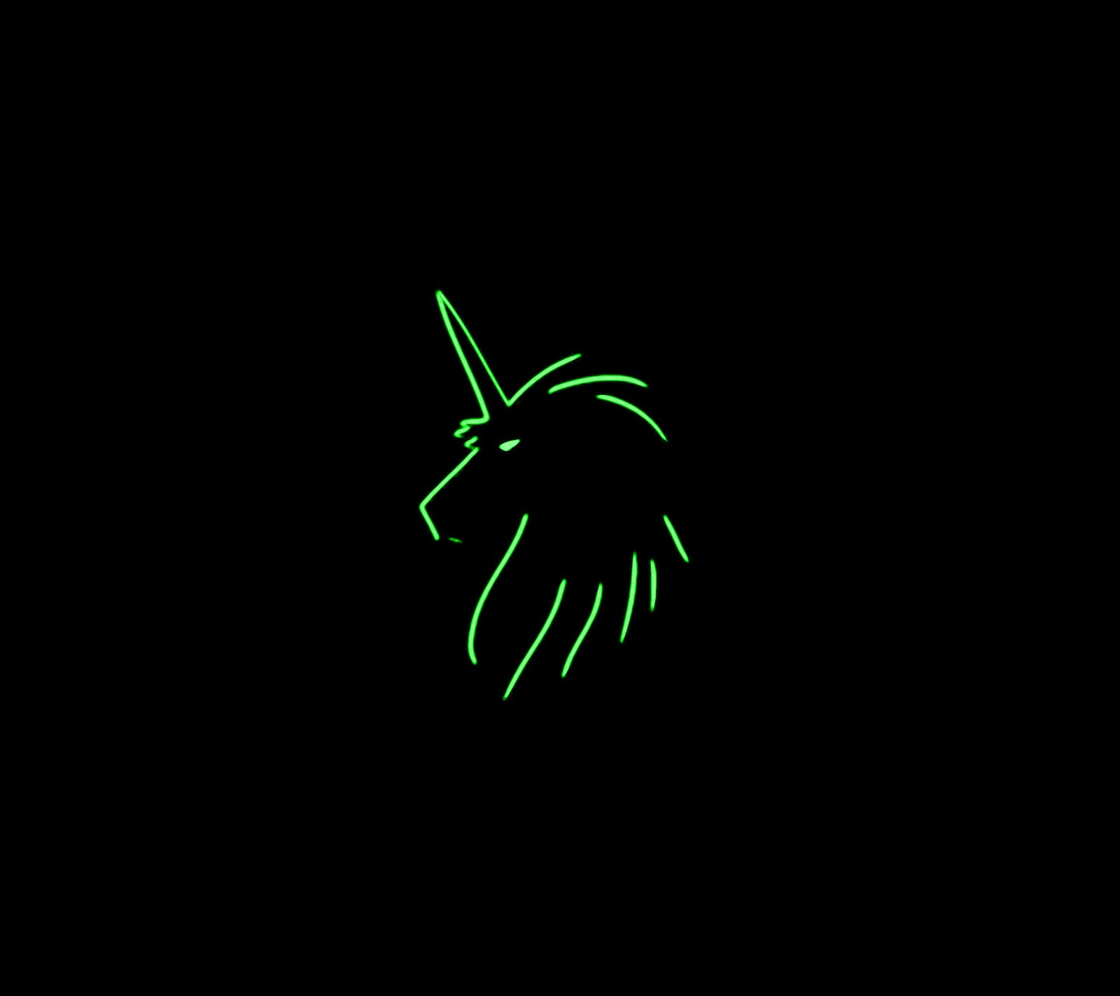 A close up of a neon unicorn head in the dark (android, aokp, horse)