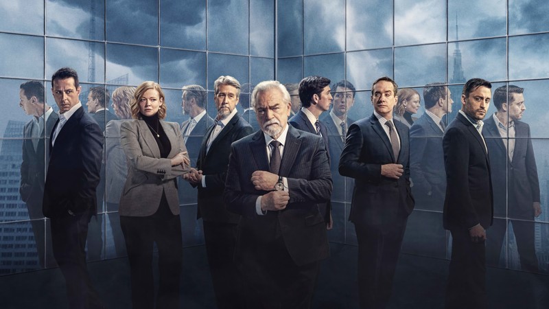 Um grupo de homens em ternos em pé em frente a uma parede. (succession, temporada 4, season 4)