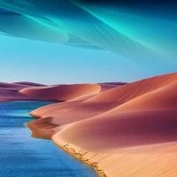 Surreal Desert Meets Tranquil Sea at Sunset