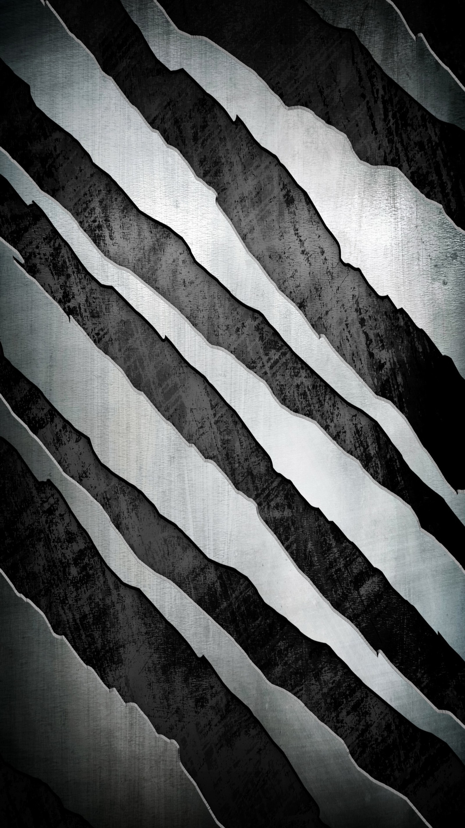 A close up of a metal surface with a black and white pattern (abstract, landscape, love, nature, view)