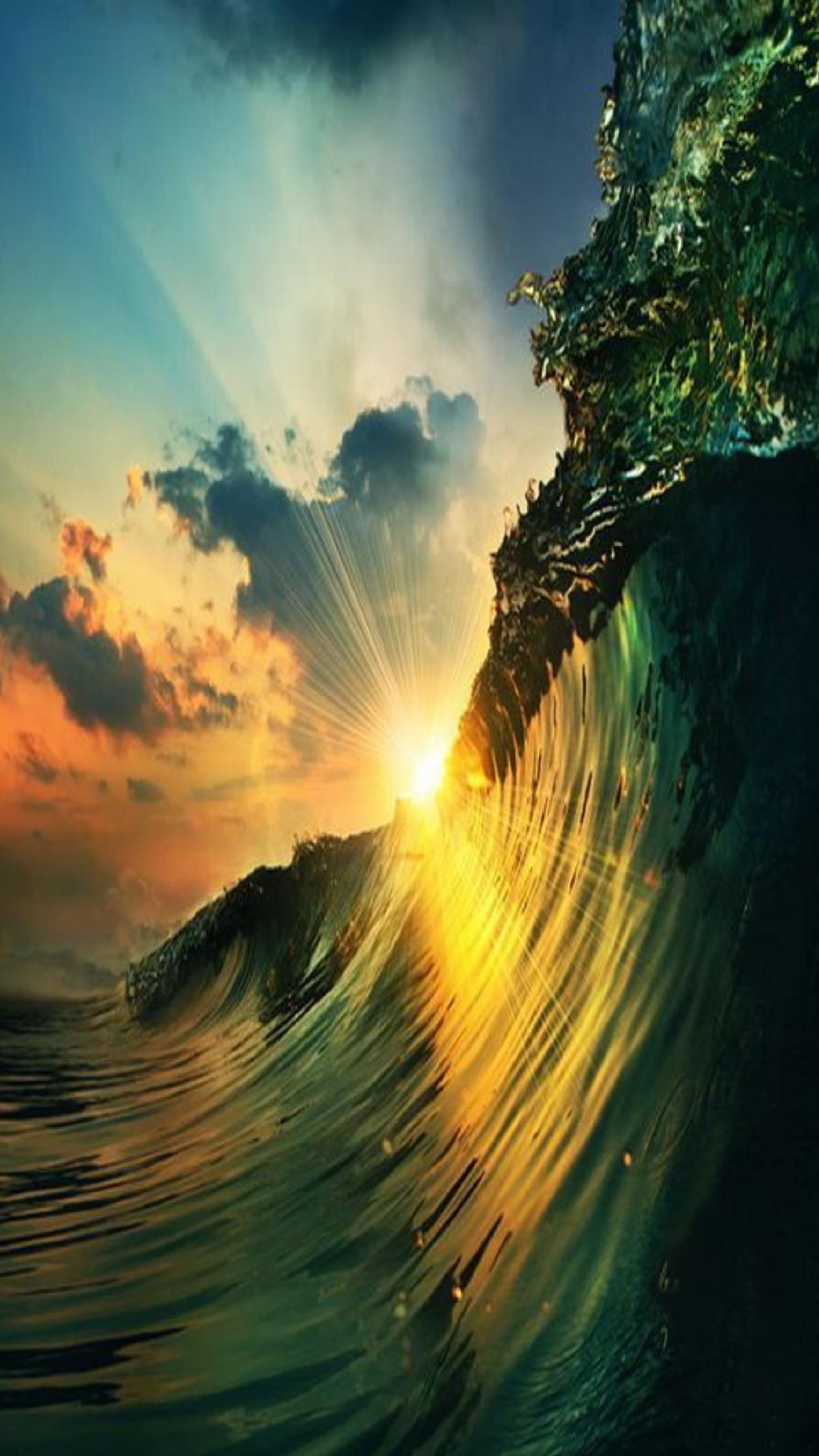 A close up of a wave with a sun setting in the background (hgdf, sfd)