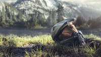 Master Chief's Helmet Amidst Serene Wilderness in Halo Infinite