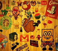 Collage coloré de logos et de personnages sur un fond en bois.