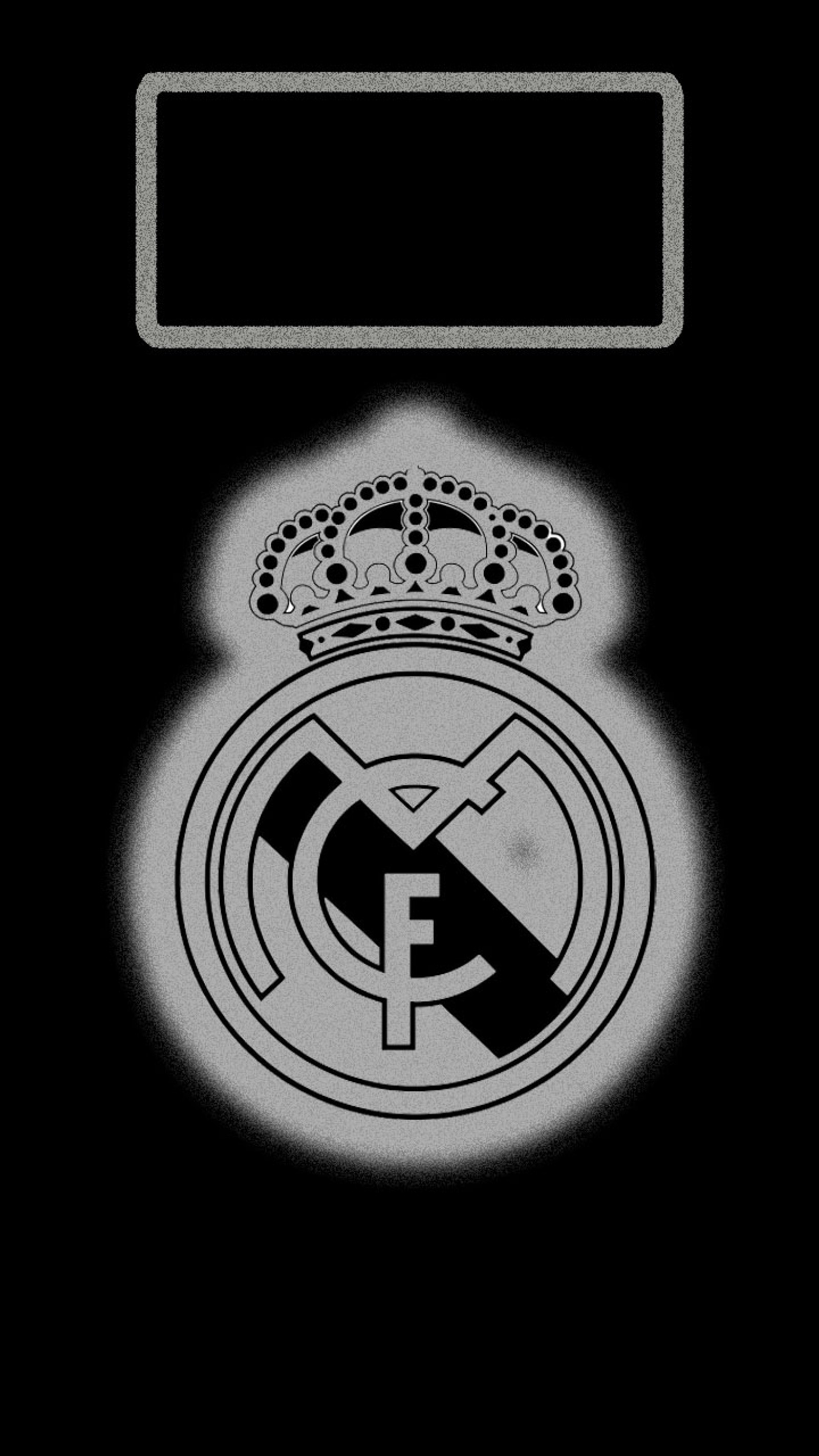 A close up of a cell phone with a logo on it (halamadrid, real, realmadrid, rm)