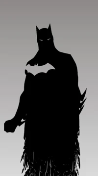 Silhouette von Batman mit einer Waffe, die das Wesen eines Superhelden in einer dynamischen Pose verkörpert.