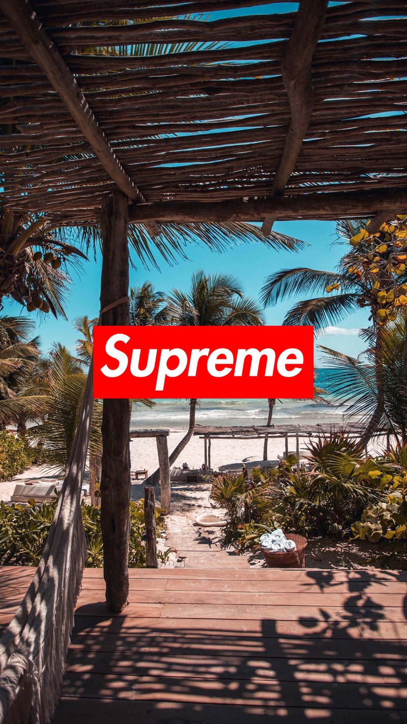 Логотип supreme на деревянной платформе с видом на пляж (пляж, бренд, свет, логотип, солнечный)