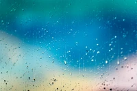 Gotas de agua cristalinas sobre un fondo azul - Fotografía en primer plano