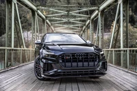 2021 Audi SQ8 TDI on a Rustic Bridge: A Fusion of Power and Elegance