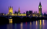 Illuminated Houses of Parliament and Big Ben Reflected on the River Thames at Dusk