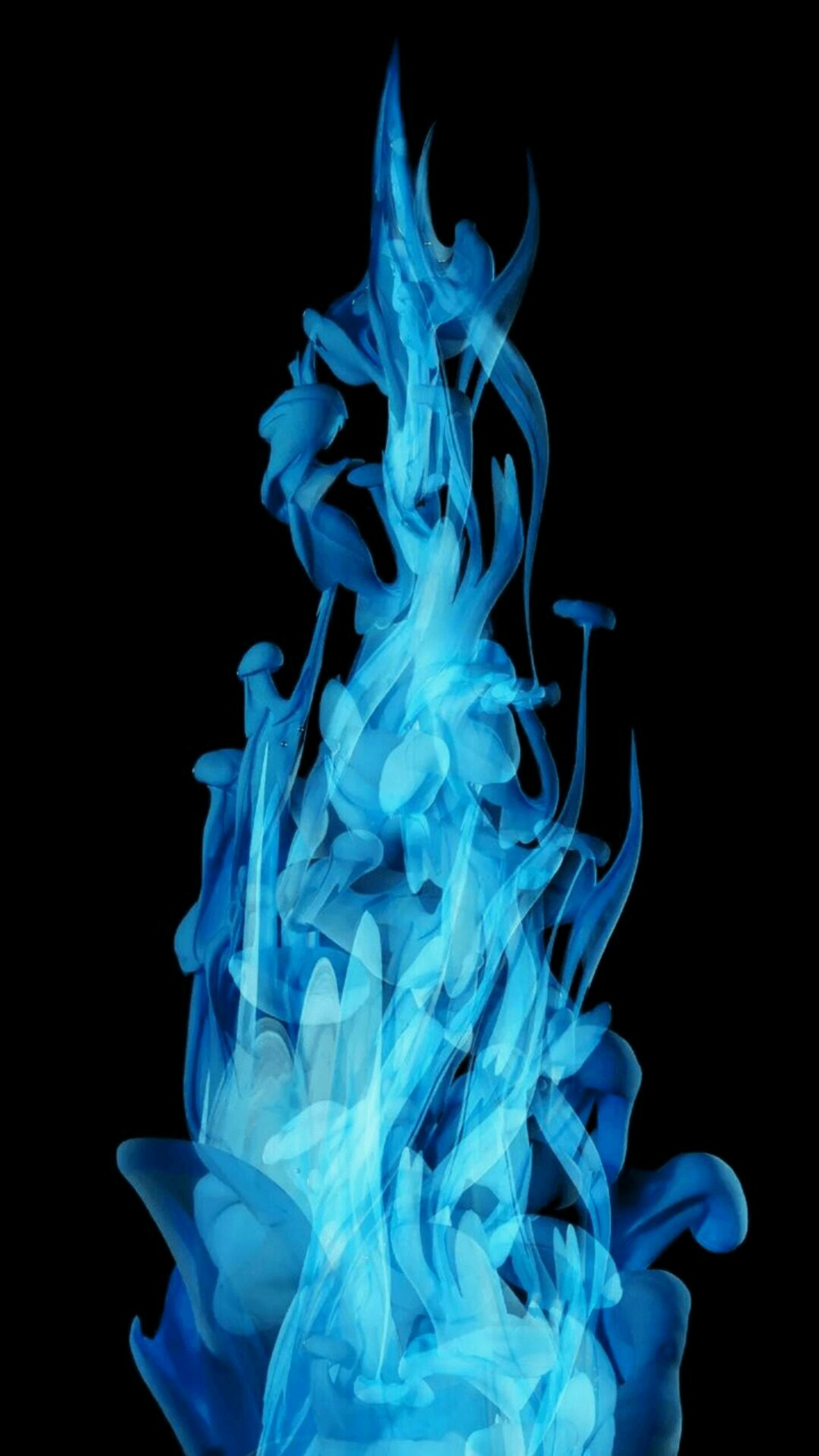 A close up of a blue smoke is in the air (art, azure, liquid, electric blue, gas)