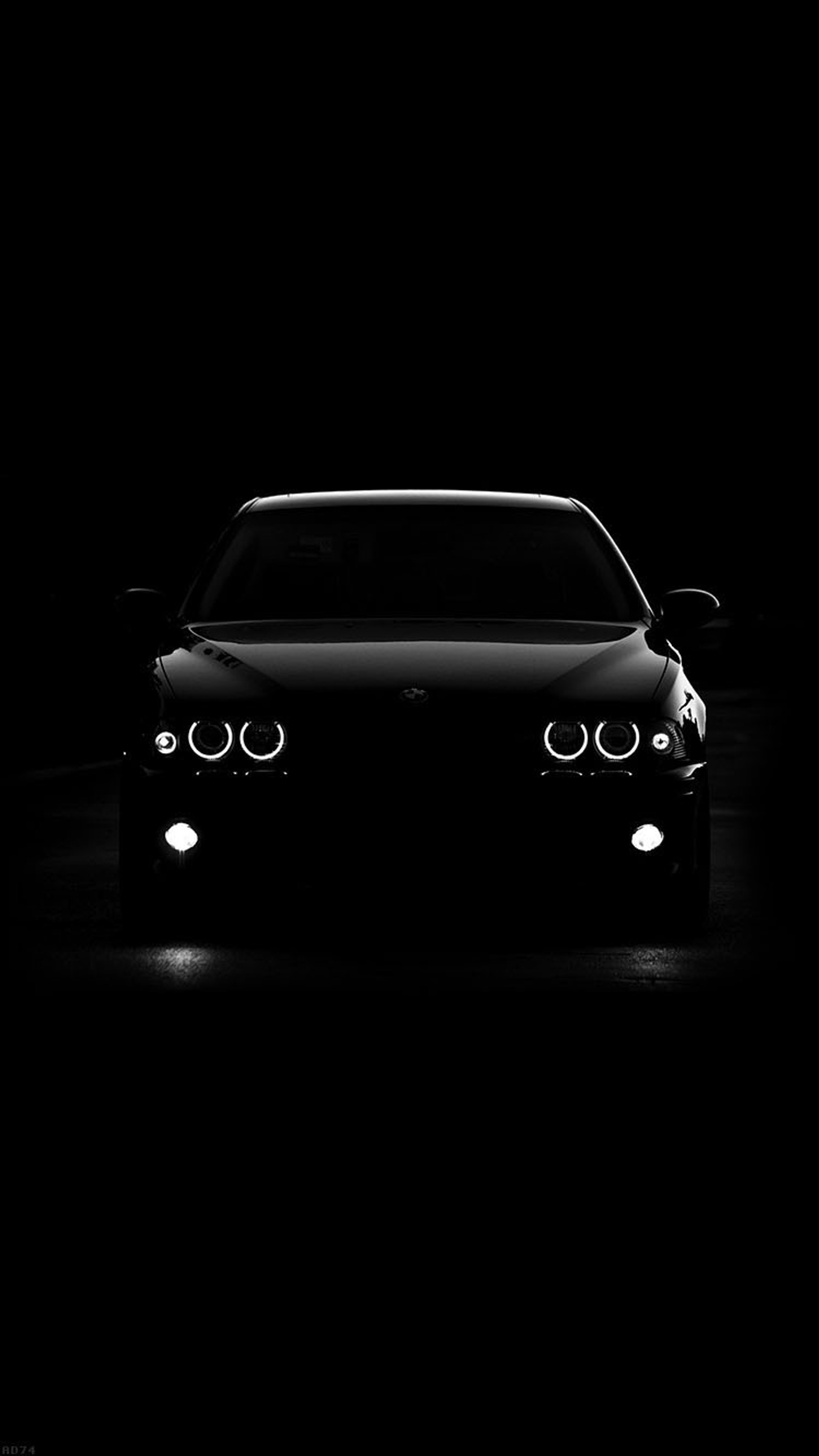 A black and white photo of a car in the dark (car, foba)