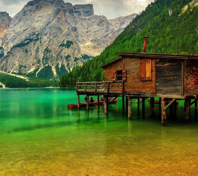 Serene Lakeside Cabin with Majestic Mountain Backdrop