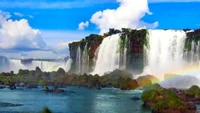 Majestic Waterfall Cascading Through Lush Landscapes