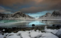 Snowy Mountain Shoreline at Dusk