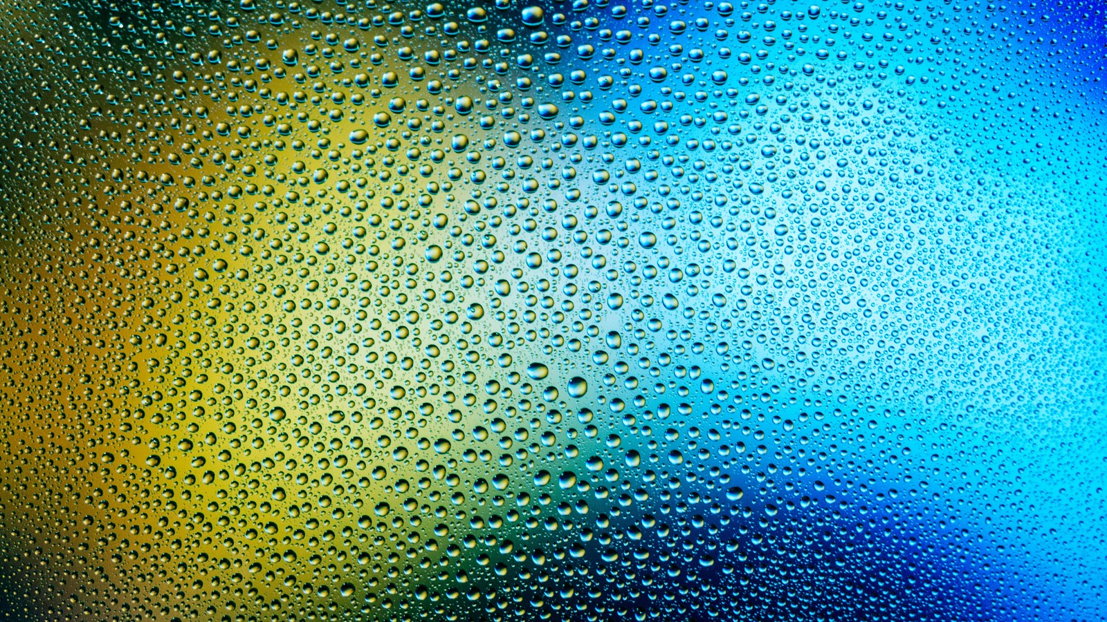 A close up of a glass bottle with water droplets on it (texture, art, circle, electric blue, pattern)