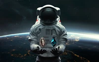 Astronaute tenant Bitcoin et Ethereum au-dessus de la Terre dans l'espace