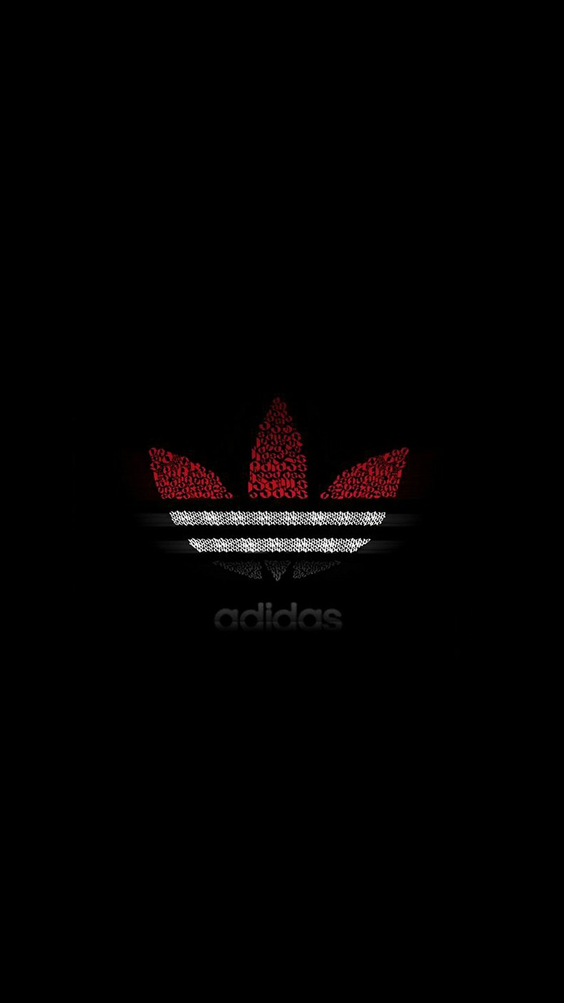 Близкий план красного и белого логотипа adidas на черном фоне (дизайн, логотип, спорт)