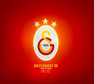 Logotipo do Galatasaray SK com três estrelas e ano de fundação 1905 em um fundo vermelho