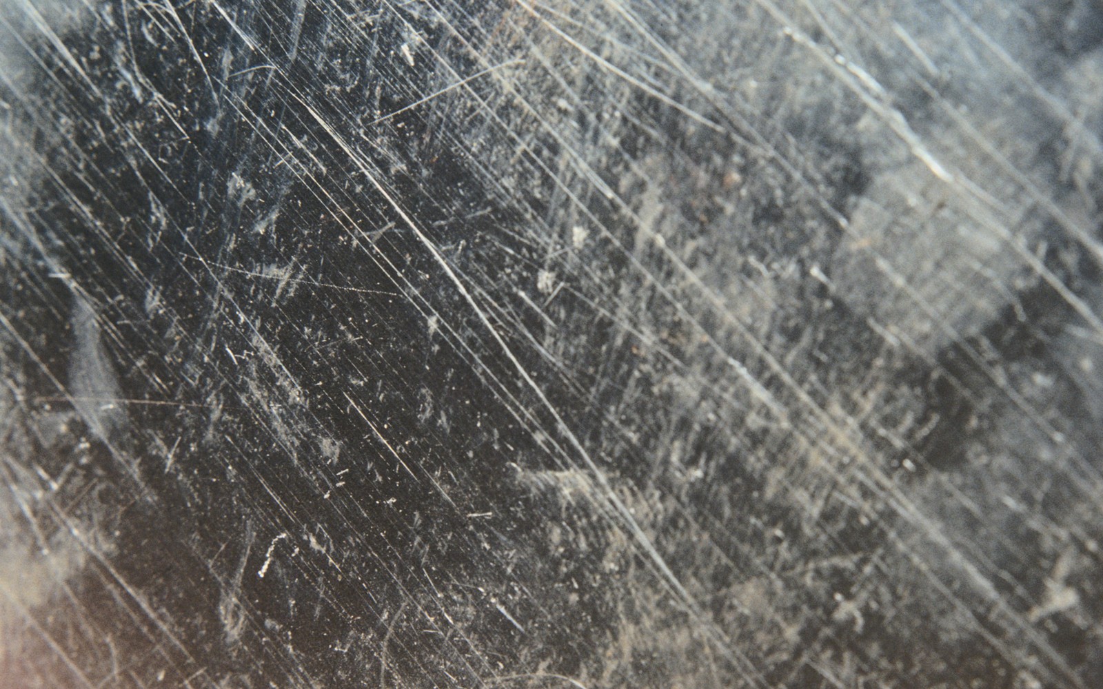 Arafed view of a dirty window with a lot of scratches (black sabbath, album, heavy metal, wood, black)