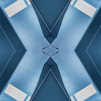 Symmetrical Modern Architecture with Mirrored Pattern in Blue Tones