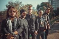 Social Group of Bearded Friends Posing Near a Tree