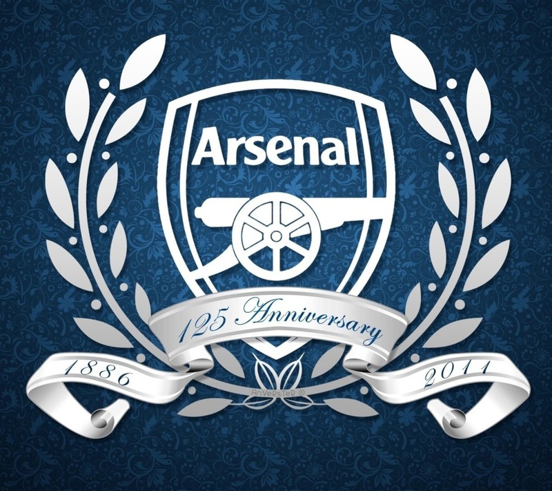 Das logo von arsenal wird auf einem blauen hintergrund angezeigt (ekhtj5, jrtgye56)