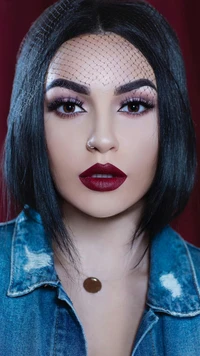 Striking Portrait of a Beauty with Bold Makeup and a Denim Jacket