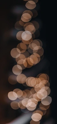 Luces navideñas cálidas en un suave patrón bokeh