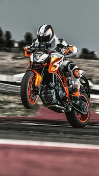 KTM Duke in Action: Thrilling Leap with Dynamic Performance