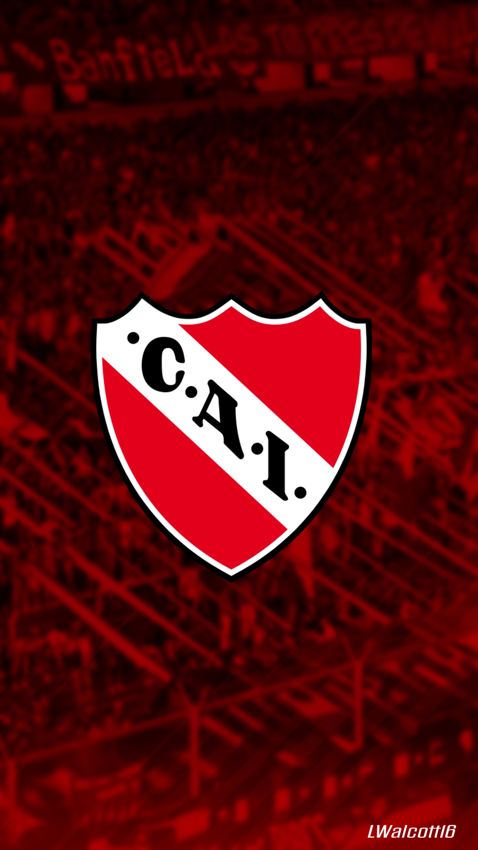 Un gros plan d'un bouclier rouge et blanc sur fond rouge (argentine, cai, football, futbol, indépendant)