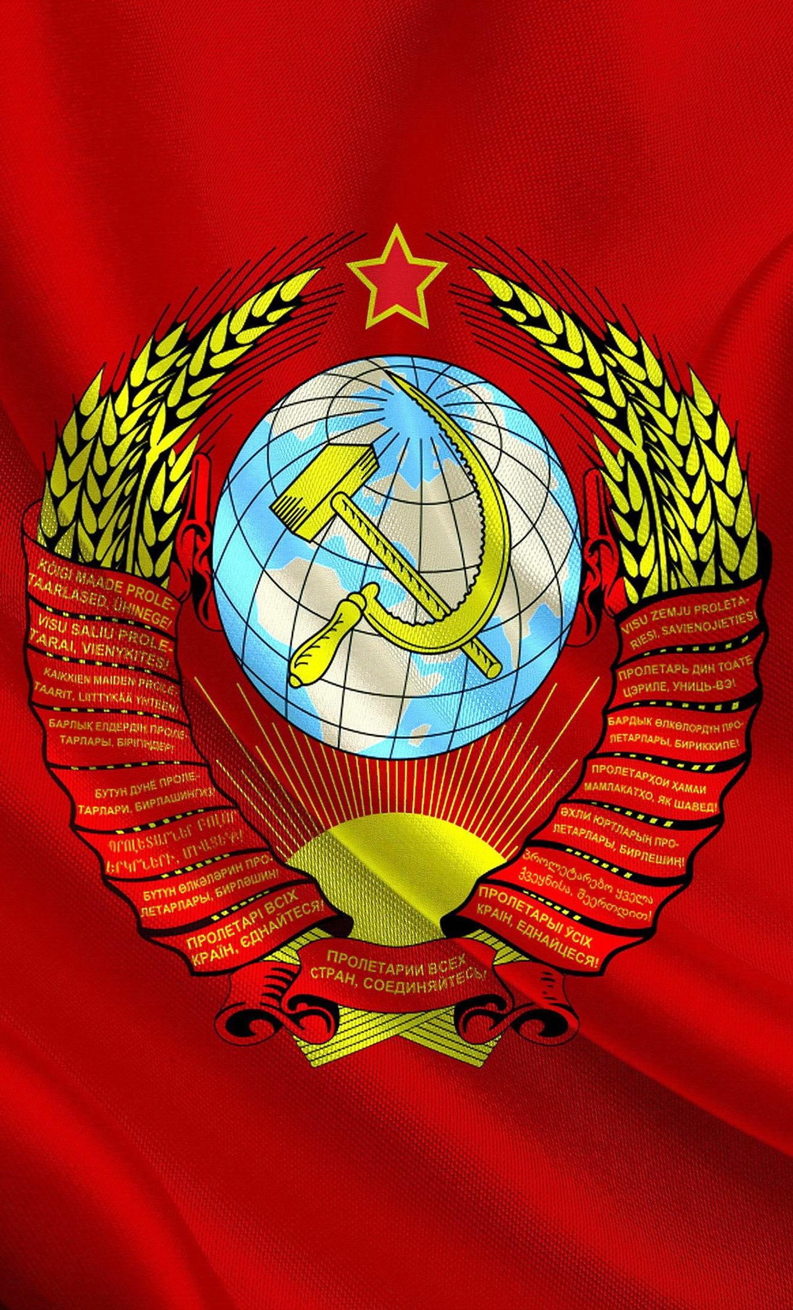 A close up of a red flag with a hammer and a star (color, red, russia)