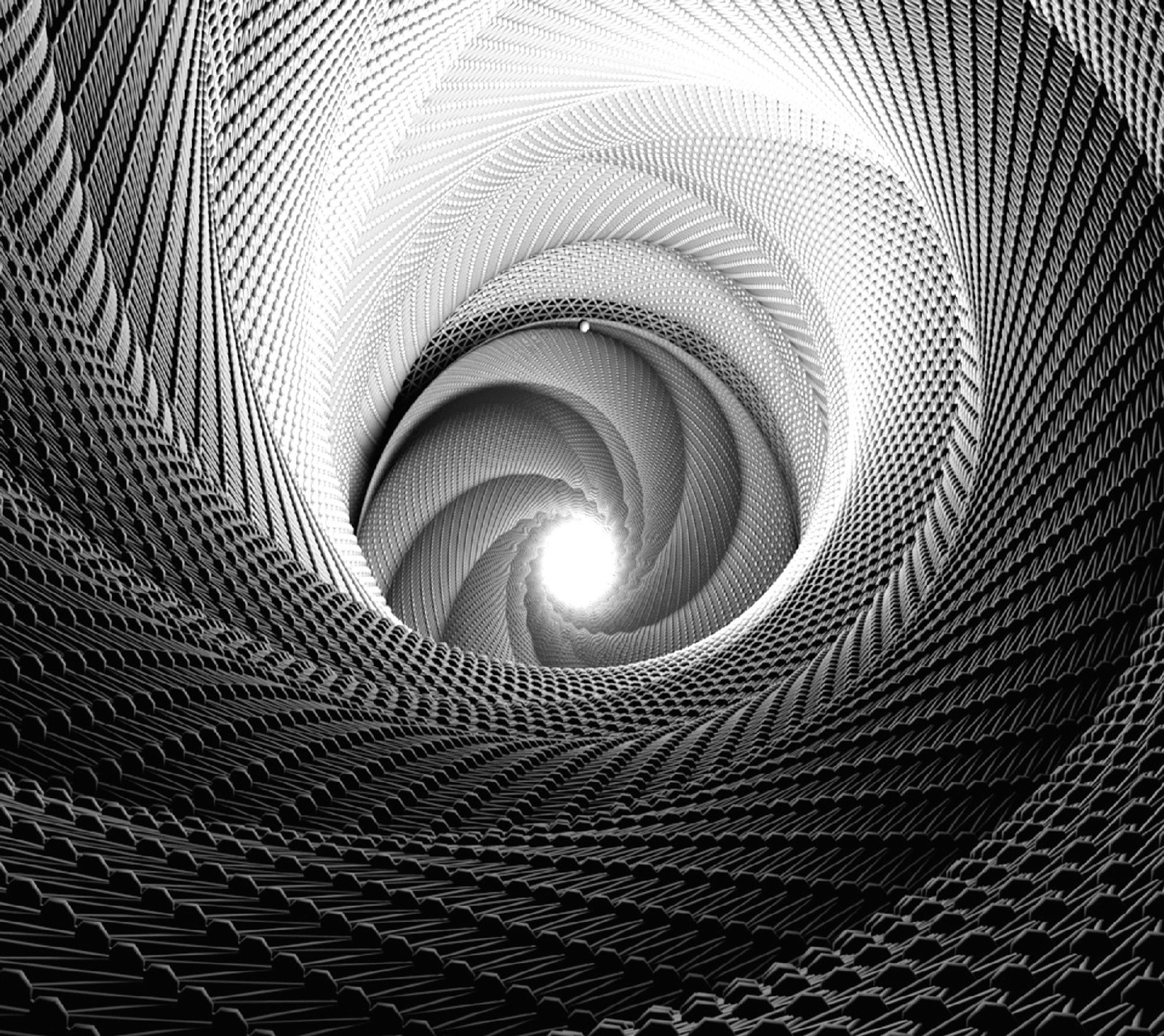 A black and white photo of a spiral shaped object (zvrk)