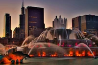 Fontaine majestueuse au crépuscule au milieu d'un paysage urbain vibrant