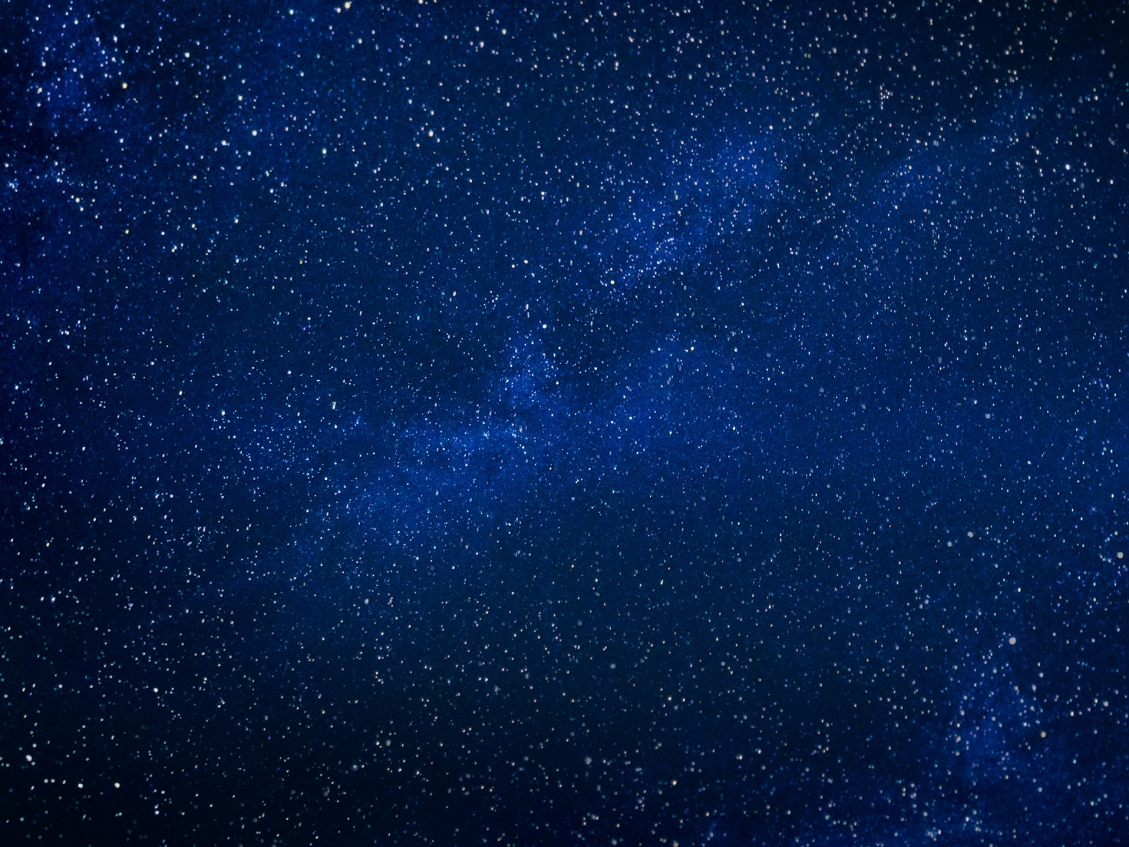 Un cielo azul oscuro con estrellas y algunos pequeños puntos blancos (espacio exterior, atmósfera de la tierra, estrella, azul, objeto astronómico)