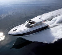 Sleek Yacht Cutting Through Tranquil Ocean Waters