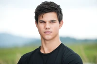 Taylor Lautner as Jacob Black: Confident Portrait of the Twilight Saga Star