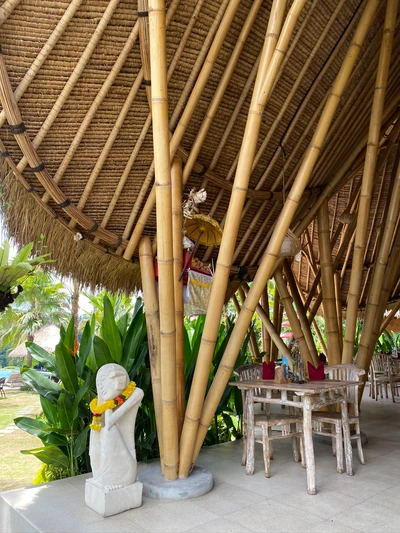 Bamboo Structure with Outdoor Furniture and Lawn Ornament