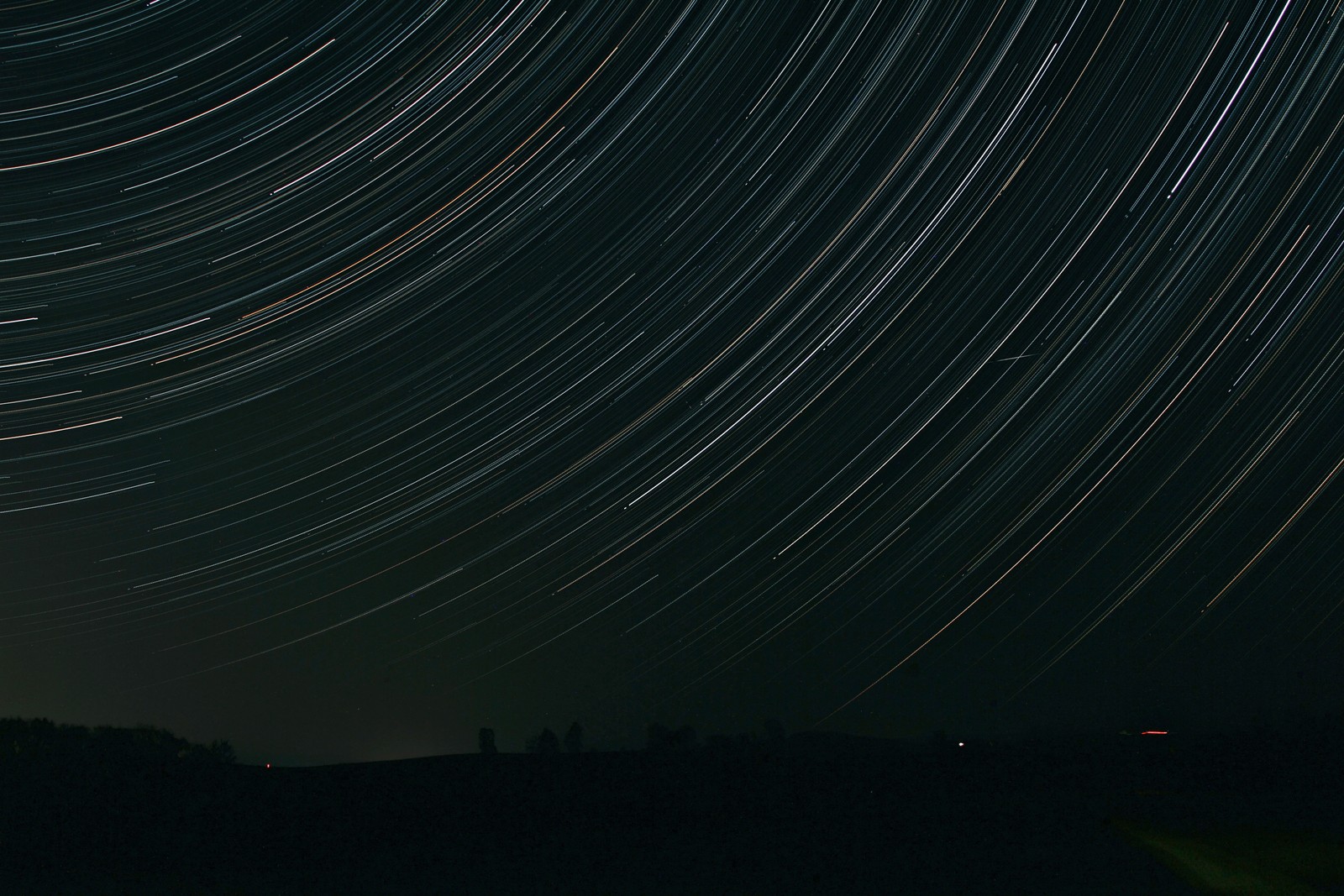 Arafed image of a night sky with a star trail (star, night sky, black, night, atmosphere)