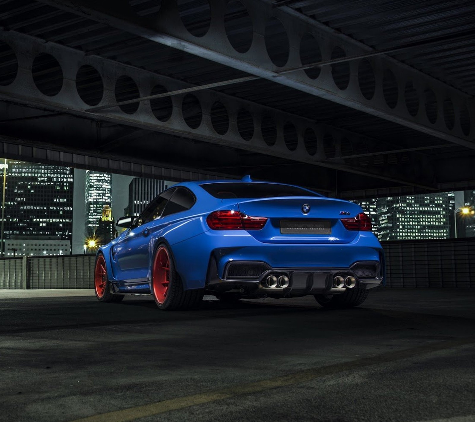 A close up of a blue bmw car parked in a parking garage (blue, bmw, car, super, tuned)