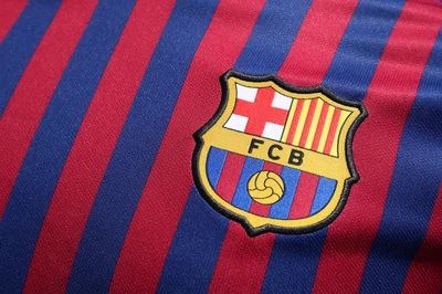 FC Barcelona Jersey Emblem on Striped Fabric