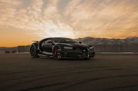 Bugatti Chiron Sport: Um hipercarro preto contra um pôr do sol deslumbrante